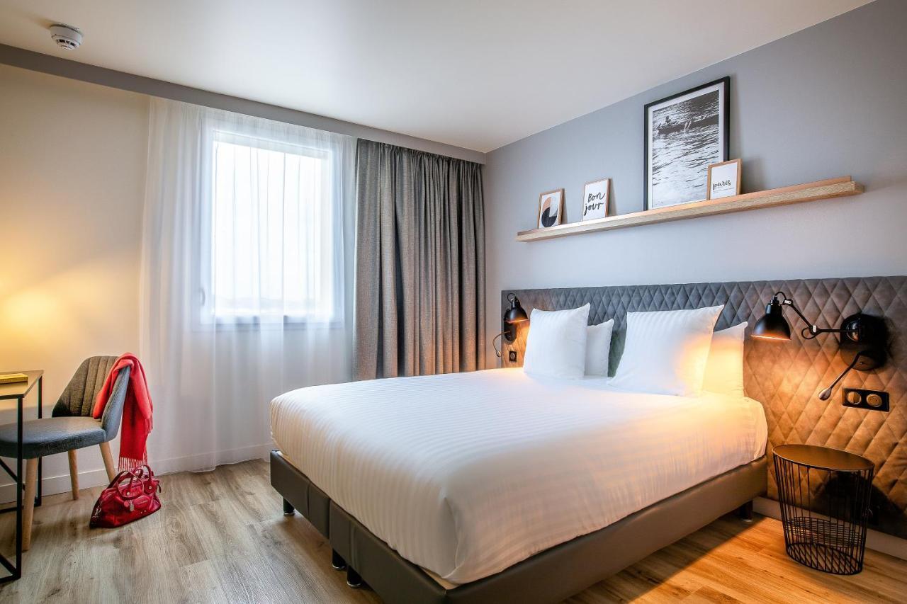 Hotel Mercure Paris Gennevilliers Esterno foto
